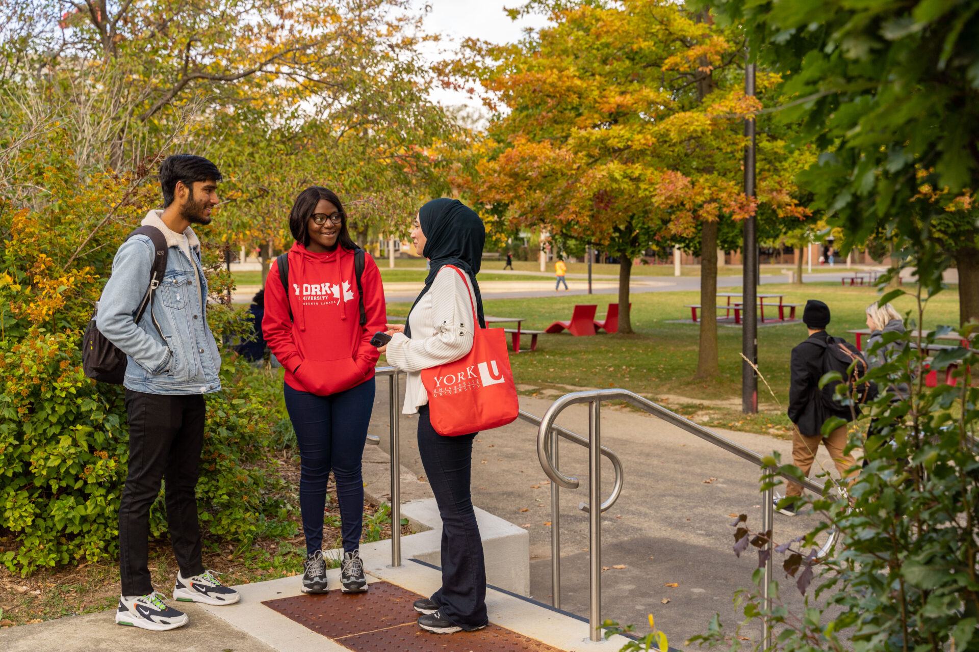 Students standing and talking to each other