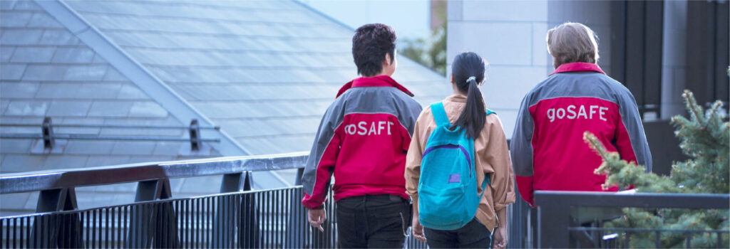 goSafe employees escorting student