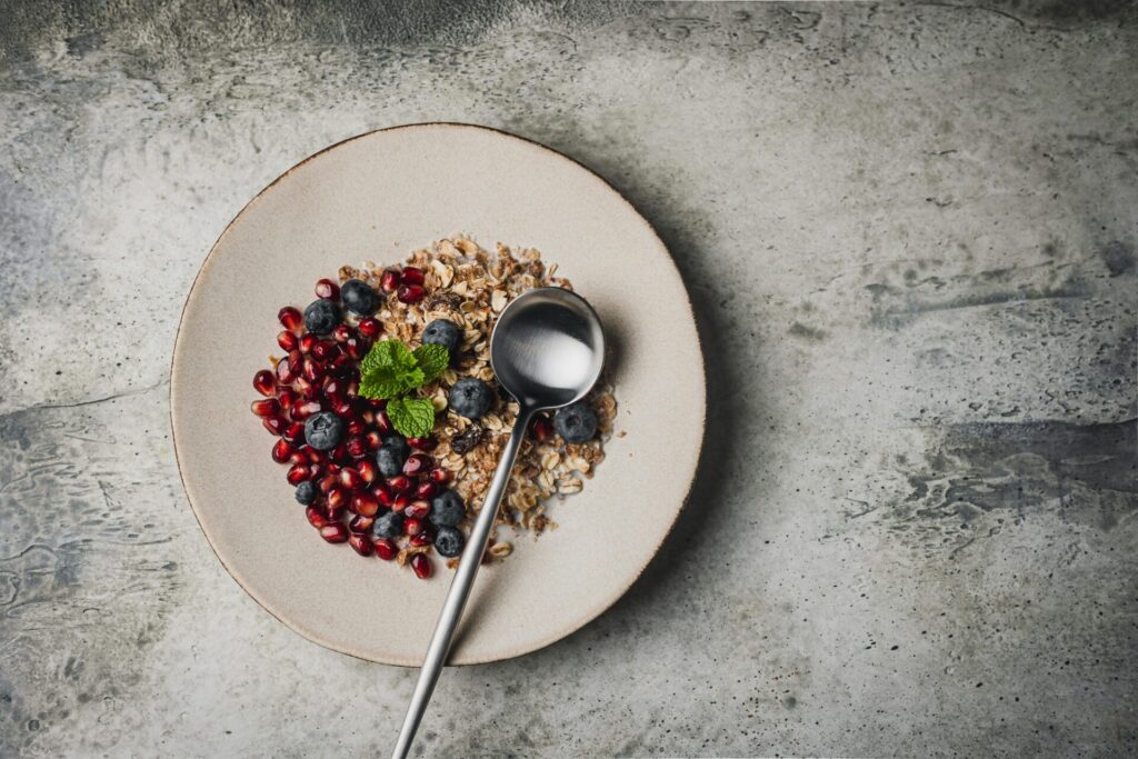 granola with pomegranate and blueberries