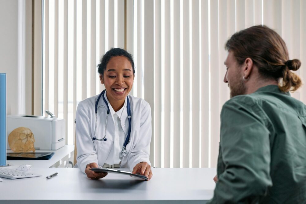 Doctor talking to patient