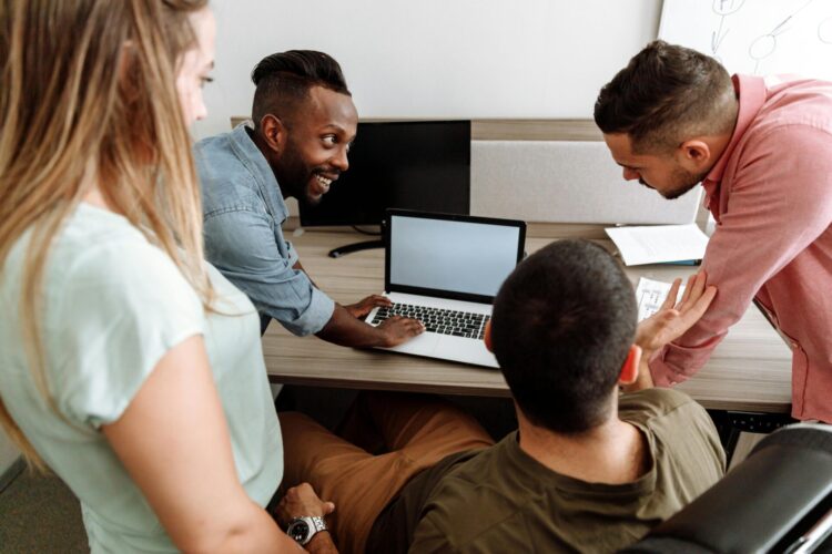 Group of people having a discussion at work