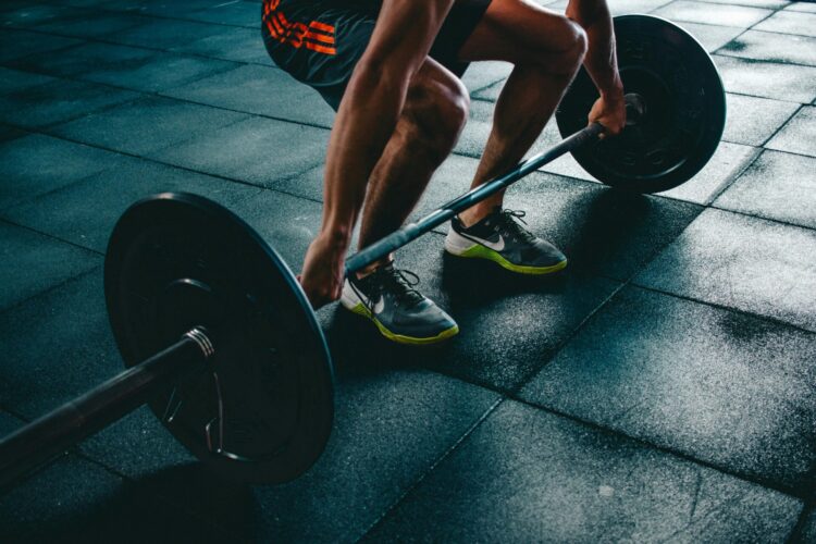 Person holding barbell