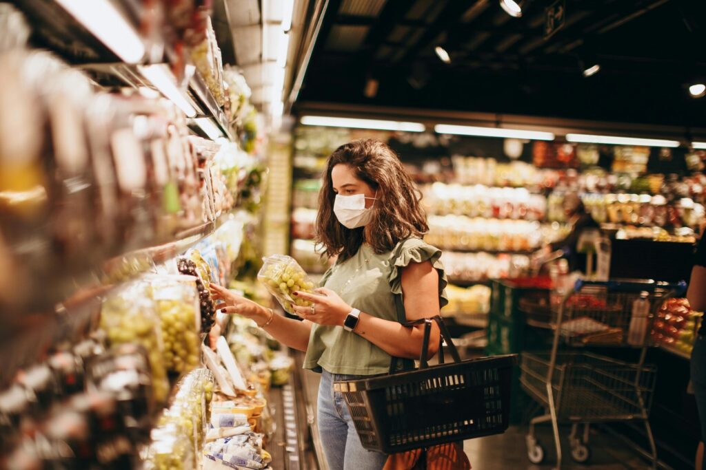 Women doing grocery shopping in a supermarket