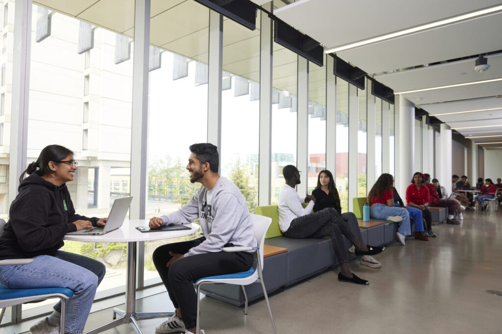 Students sitting in the lobby