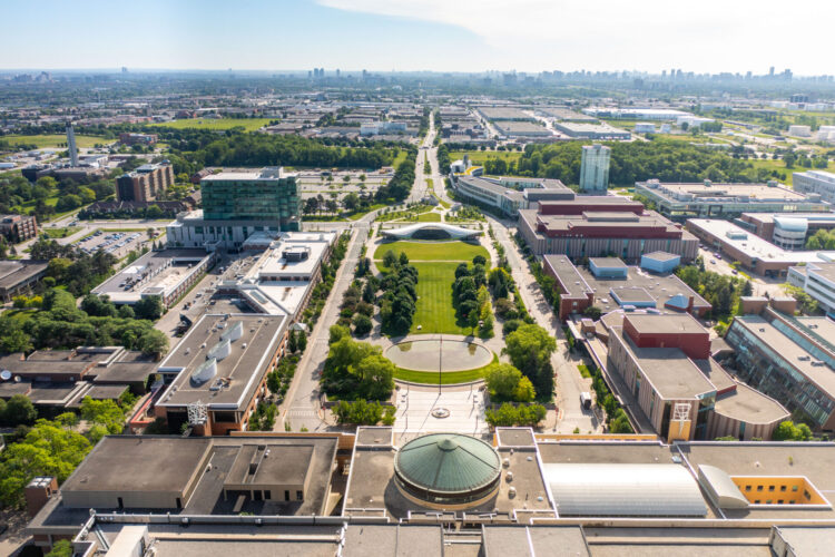 Aerial view of buildings and field