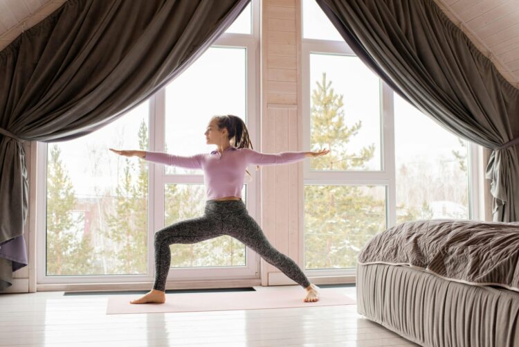 Person doing workout inside a room.