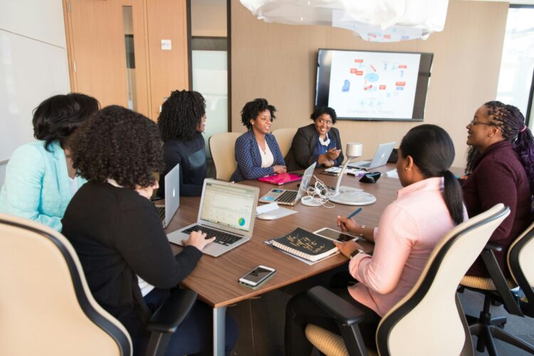 Employees having a meeting