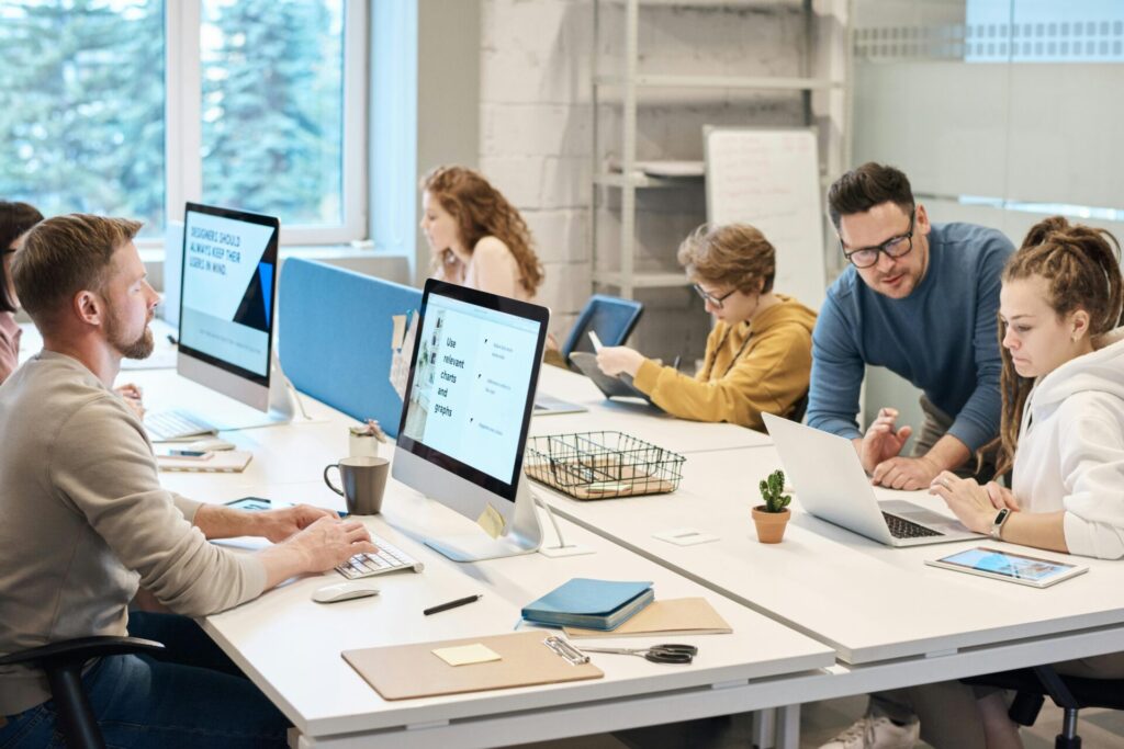 People working in front of the computers