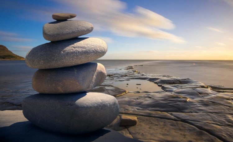 Stacked stones by the ocean