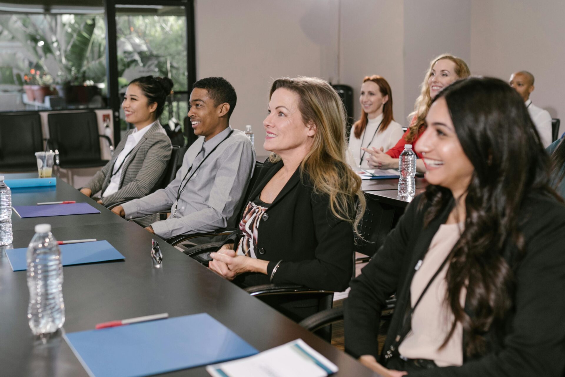 Employees smiling at a event