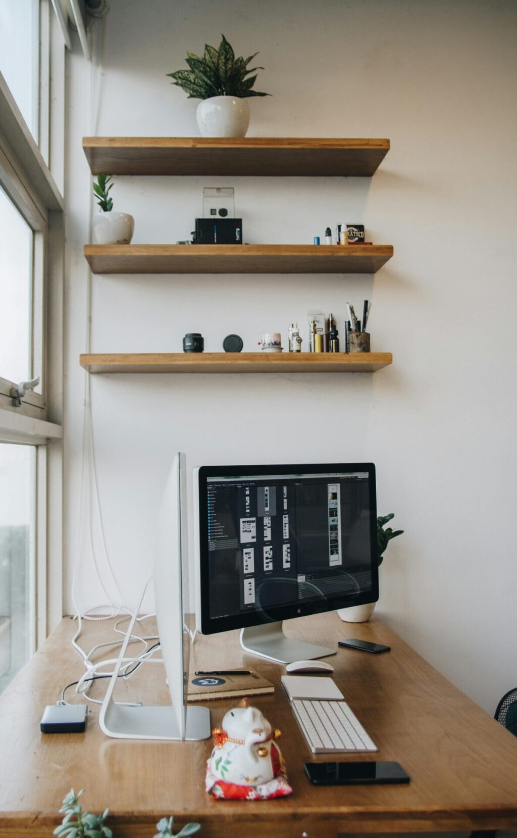 Office space with desk and wooden wall ledges