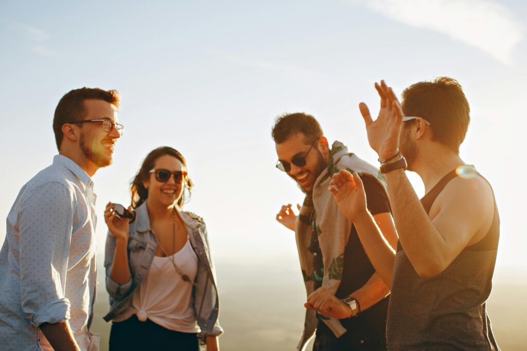 group of people having fun together under the sun