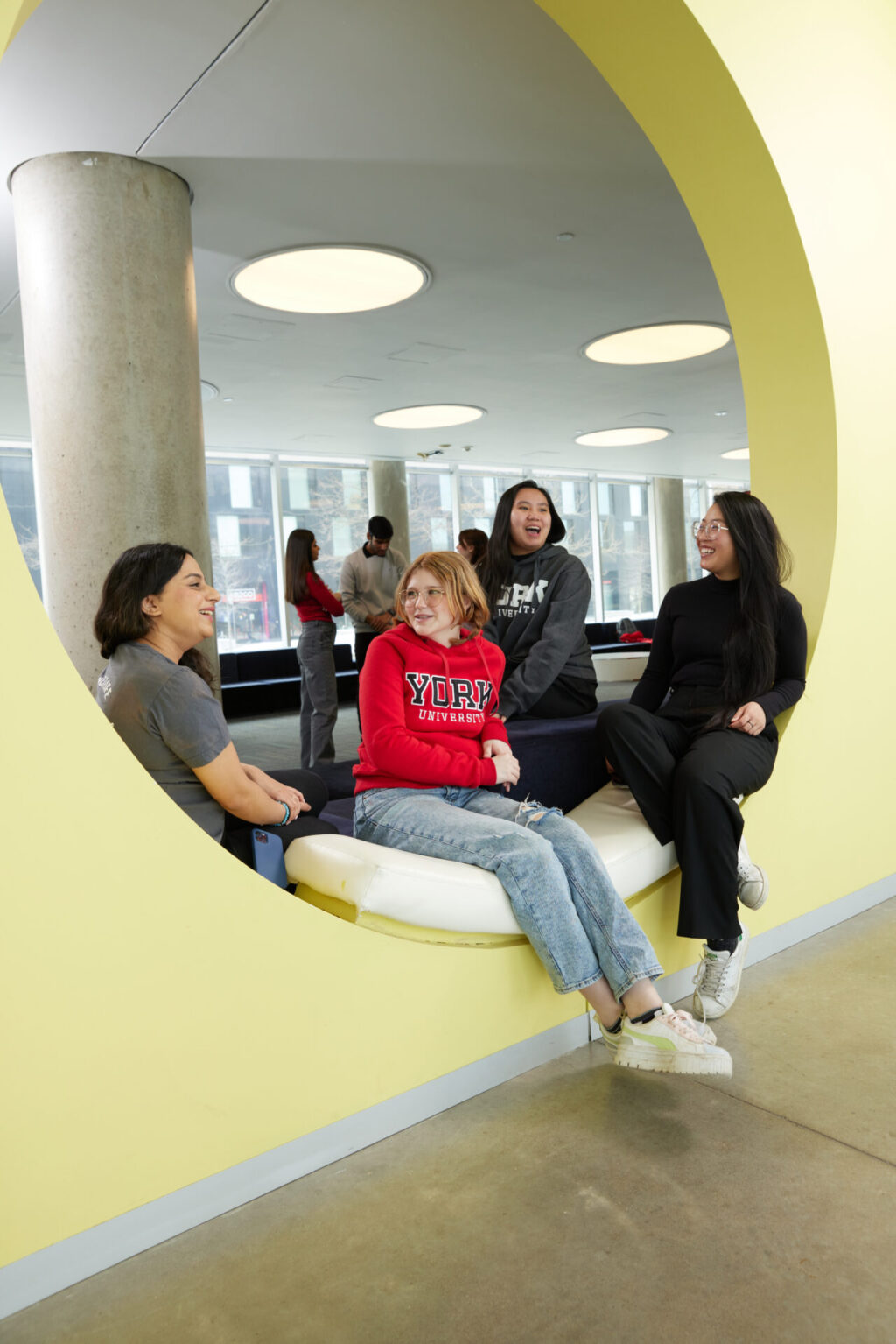 Students sitting in a lounge