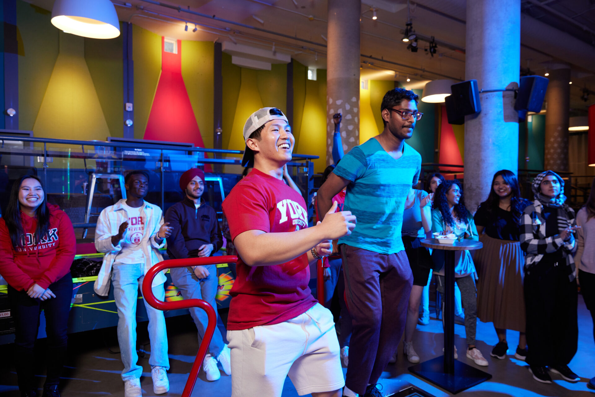 Students playing in an arcade