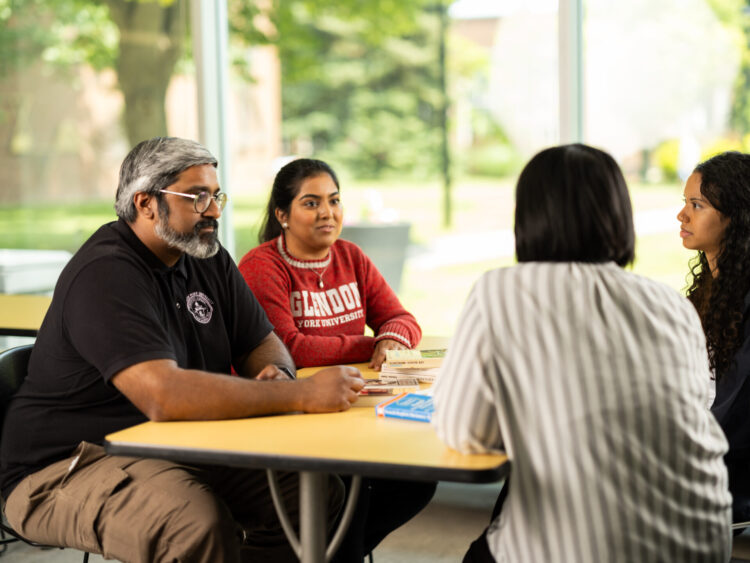 Students studying together at a table