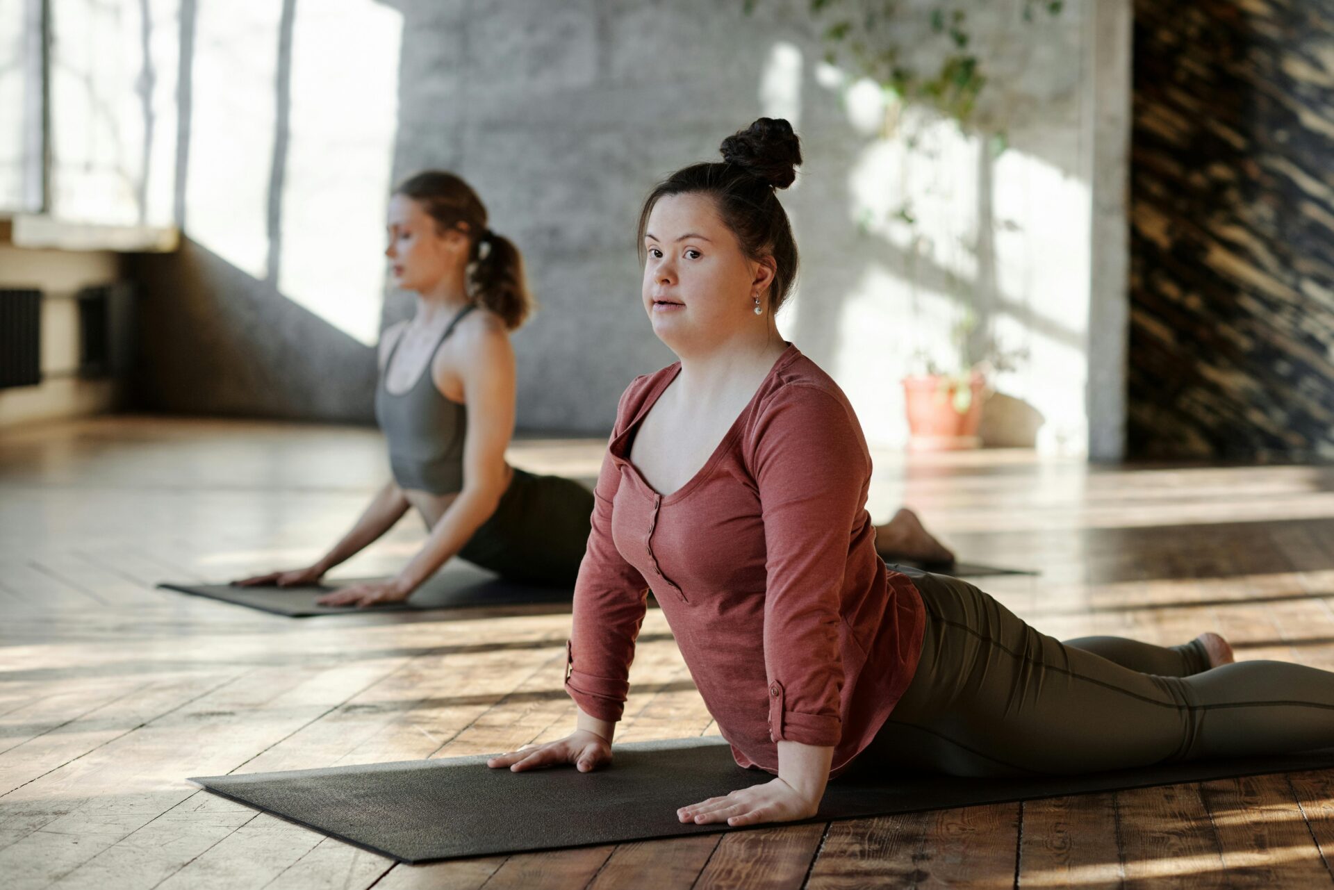 Women exercising together on yoga mats