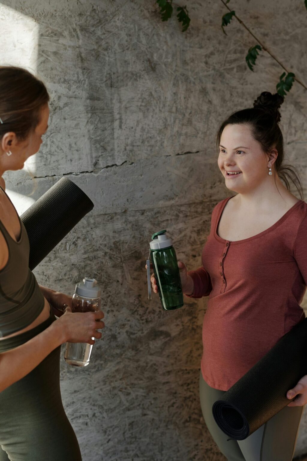 Two women having a chat after workout