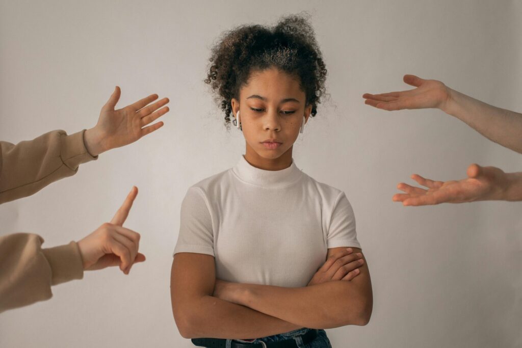 people scolding discontent by pointing to a person