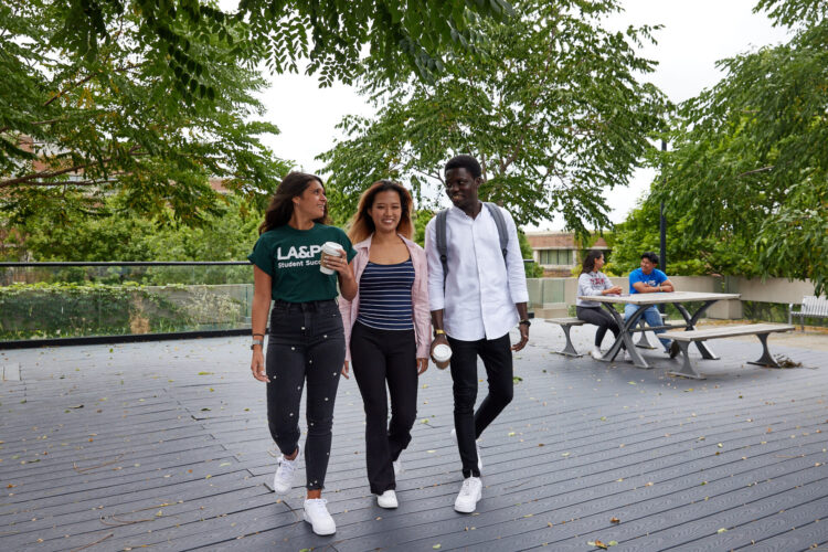 Three Students walking on Keele campus